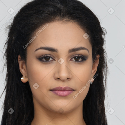 Joyful latino young-adult female with long  brown hair and brown eyes