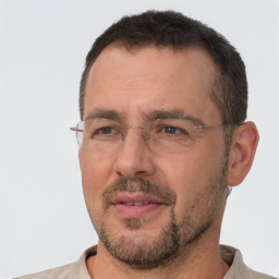 Neutral white adult male with short  brown hair and brown eyes