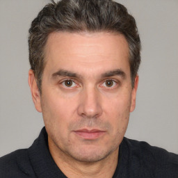 Neutral white adult male with short  brown hair and brown eyes