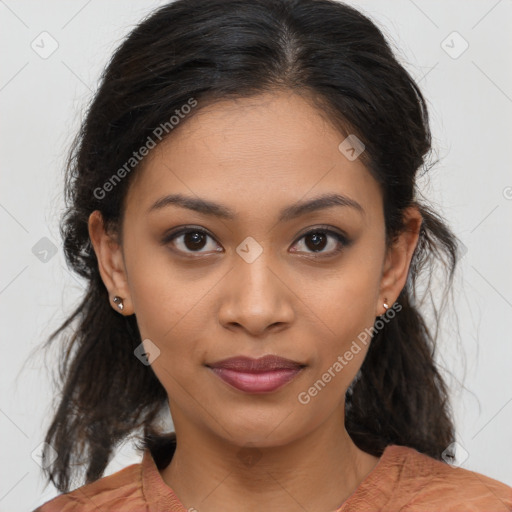 Joyful latino young-adult female with medium  brown hair and brown eyes