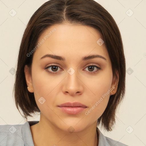 Neutral white young-adult female with medium  brown hair and brown eyes