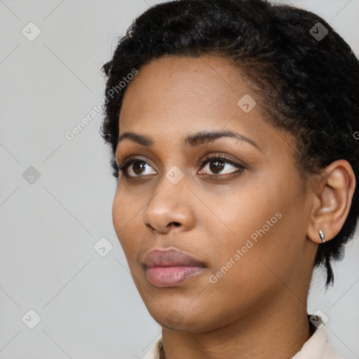 Neutral black young-adult female with short  black hair and brown eyes