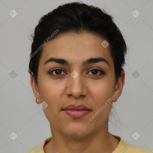 Joyful latino young-adult female with short  brown hair and brown eyes