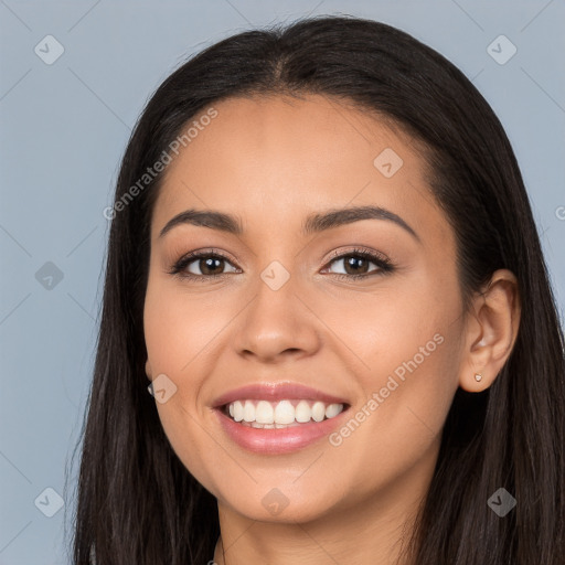 Joyful white young-adult female with long  black hair and brown eyes