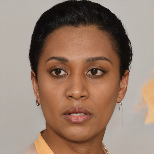 Neutral latino young-adult female with short  black hair and brown eyes