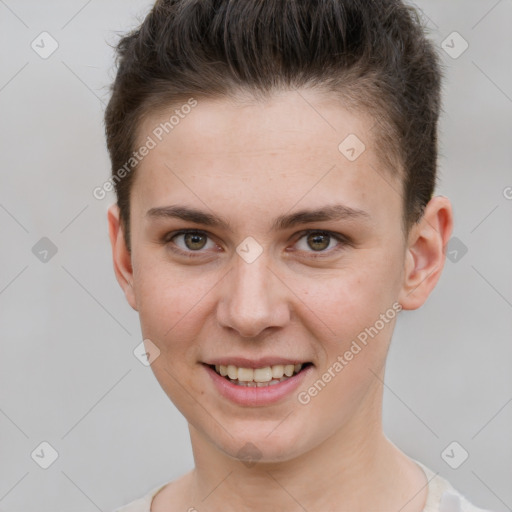 Joyful white young-adult female with short  brown hair and grey eyes