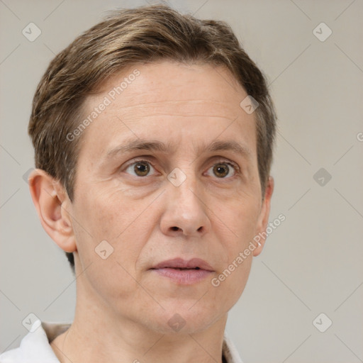 Joyful white adult male with short  brown hair and grey eyes