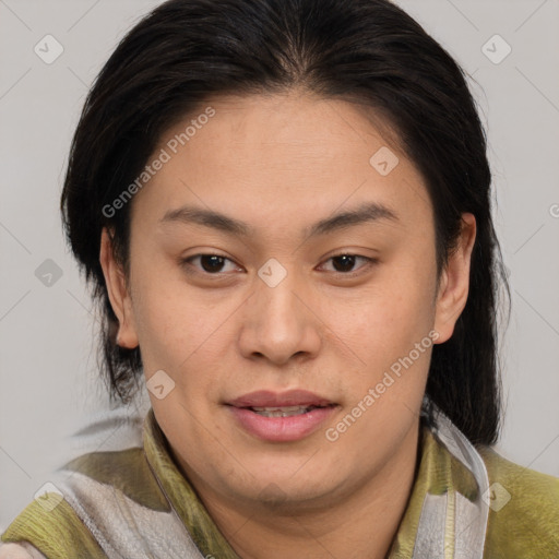 Joyful asian young-adult female with medium  brown hair and brown eyes