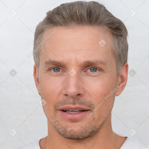 Neutral white adult male with short  brown hair and brown eyes