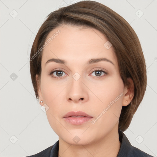 Neutral white young-adult female with medium  brown hair and grey eyes