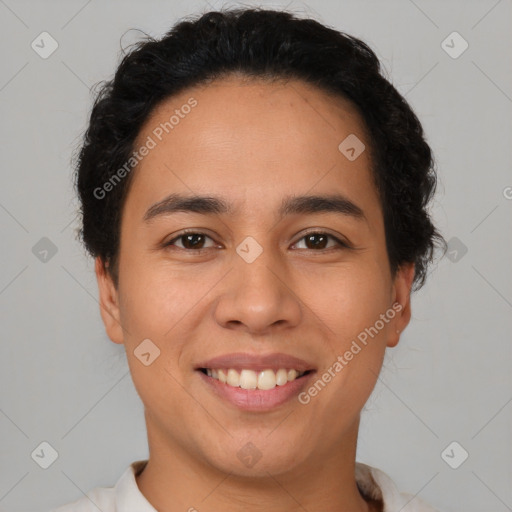 Joyful latino young-adult female with short  brown hair and brown eyes