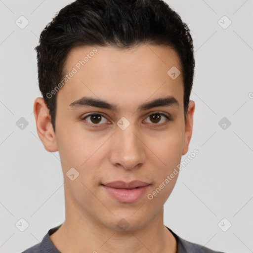 Joyful latino young-adult male with short  brown hair and brown eyes