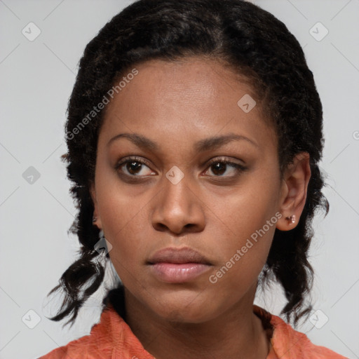 Neutral black young-adult female with medium  brown hair and brown eyes