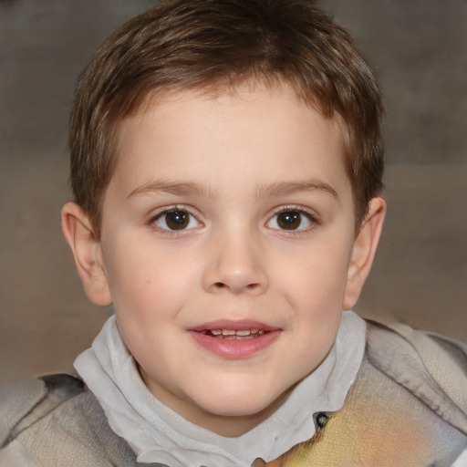 Joyful white child male with short  brown hair and brown eyes