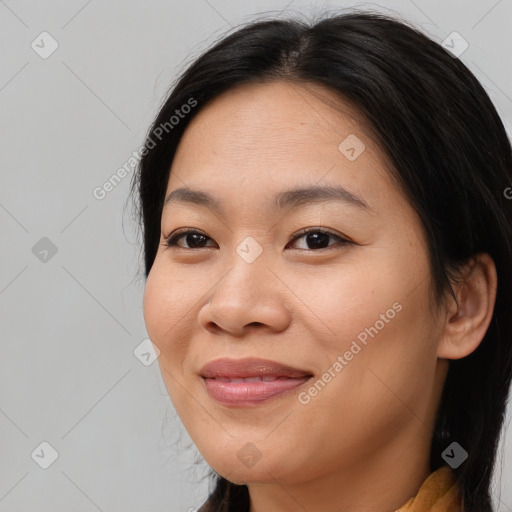 Joyful asian young-adult female with medium  brown hair and brown eyes