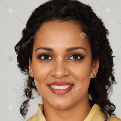 Joyful black young-adult female with medium  brown hair and brown eyes