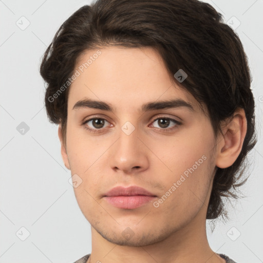 Joyful white young-adult male with medium  brown hair and brown eyes