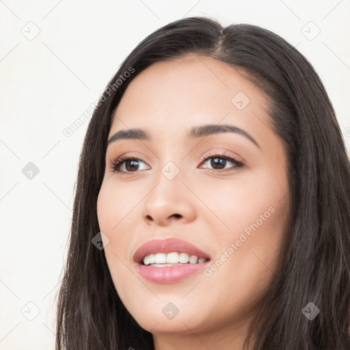 Joyful white young-adult female with long  black hair and brown eyes