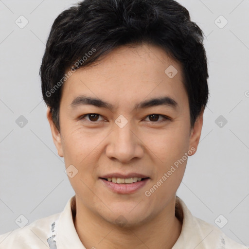 Joyful white young-adult male with short  black hair and brown eyes