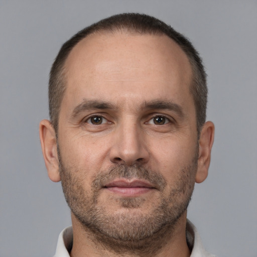 Neutral white adult male with short  brown hair and brown eyes