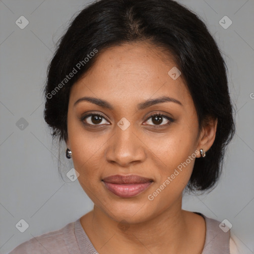 Joyful black young-adult female with medium  brown hair and brown eyes