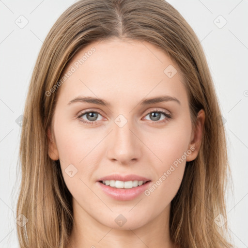 Joyful white young-adult female with long  brown hair and grey eyes