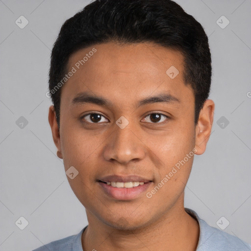 Joyful white young-adult male with short  black hair and brown eyes