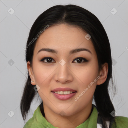 Joyful asian young-adult female with medium  black hair and brown eyes