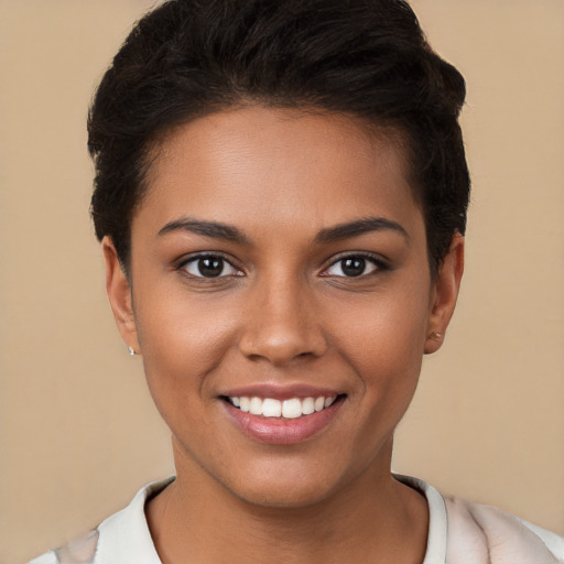 Joyful white young-adult female with short  brown hair and brown eyes