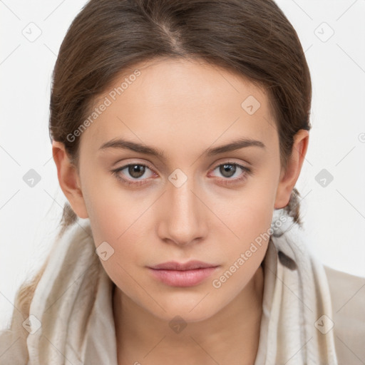 Neutral white young-adult female with long  brown hair and brown eyes