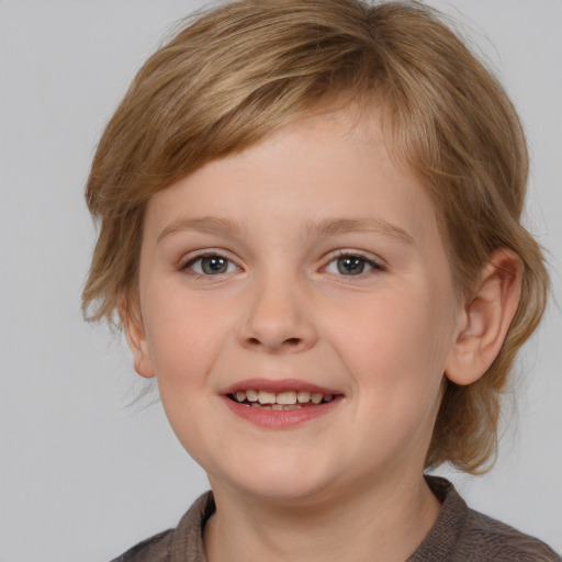 Joyful white child female with medium  brown hair and grey eyes