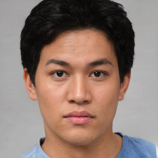 Neutral asian young-adult male with short  black hair and brown eyes