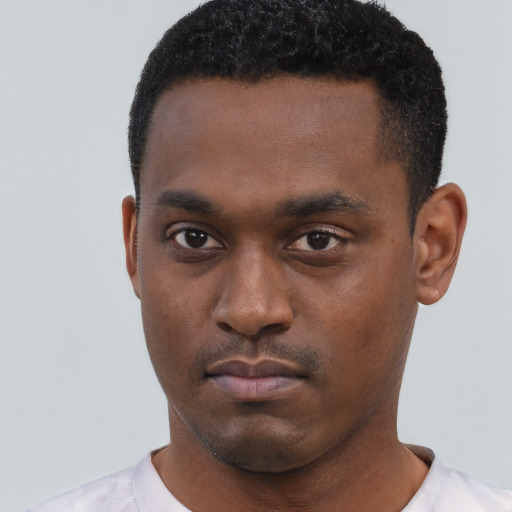 Neutral black young-adult male with short  black hair and brown eyes