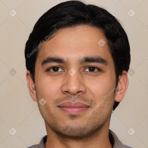 Neutral latino young-adult male with short  black hair and brown eyes