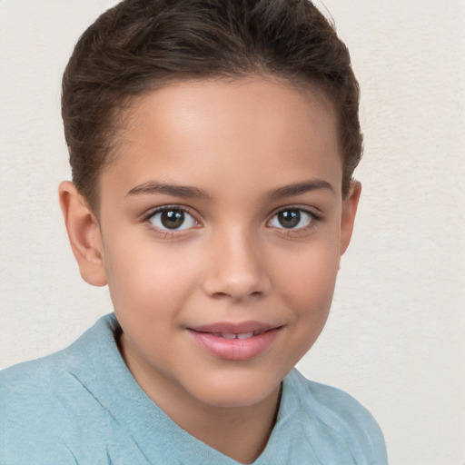 Joyful white child female with short  brown hair and brown eyes