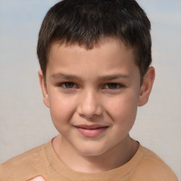 Joyful white child male with short  brown hair and brown eyes