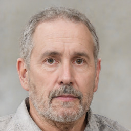 Neutral white middle-aged male with short  gray hair and brown eyes