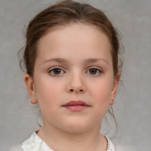 Neutral white child female with medium  brown hair and brown eyes