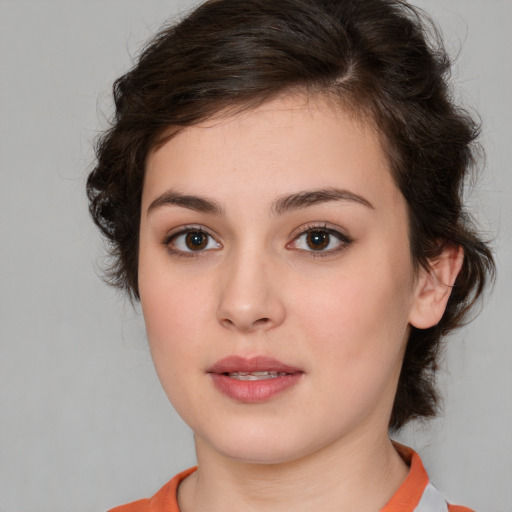 Neutral white young-adult female with medium  brown hair and brown eyes