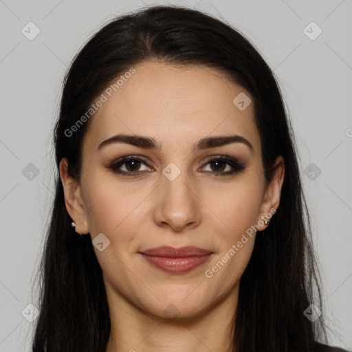 Joyful white young-adult female with long  brown hair and brown eyes