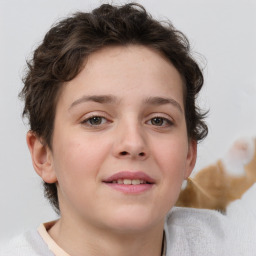 Joyful white child female with short  brown hair and brown eyes