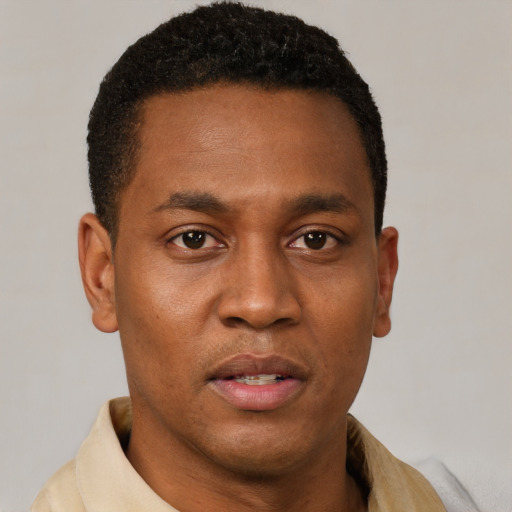 Neutral black young-adult male with short  brown hair and brown eyes
