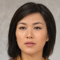 Neutral asian young-adult female with medium  brown hair and brown eyes