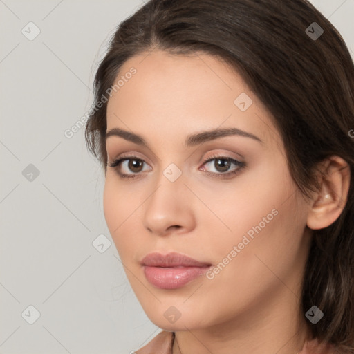 Neutral white young-adult female with medium  brown hair and brown eyes