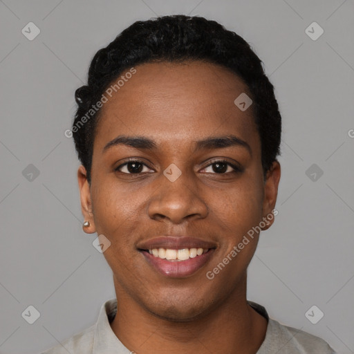 Joyful black young-adult female with short  black hair and brown eyes