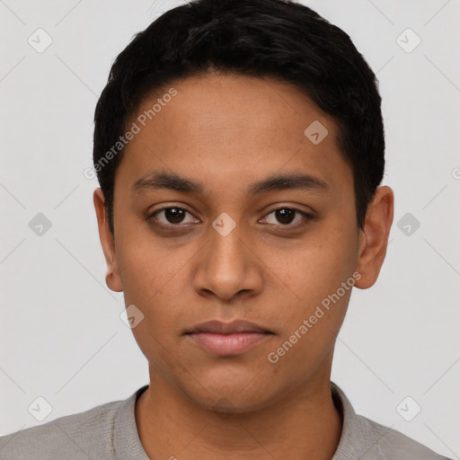 Neutral latino young-adult male with short  black hair and brown eyes