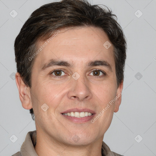 Joyful white adult male with short  brown hair and brown eyes