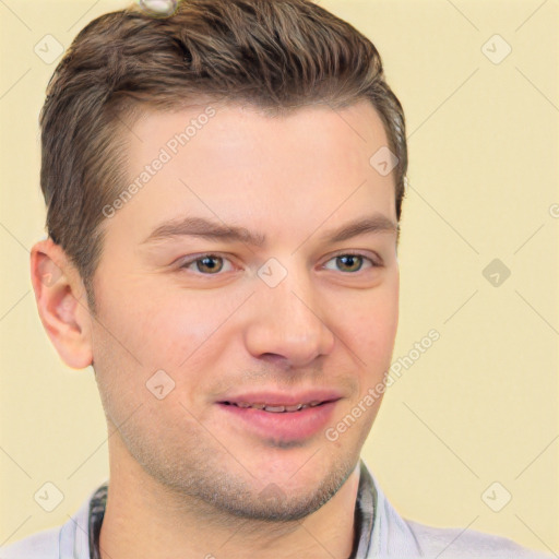 Joyful white young-adult male with short  brown hair and brown eyes