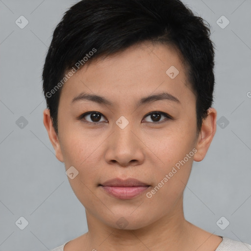 Joyful asian young-adult female with short  black hair and brown eyes