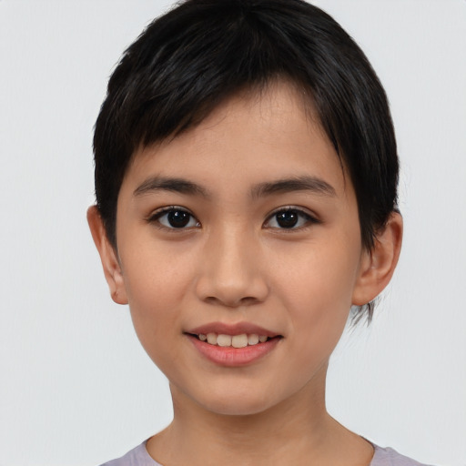 Joyful asian young-adult female with short  black hair and brown eyes